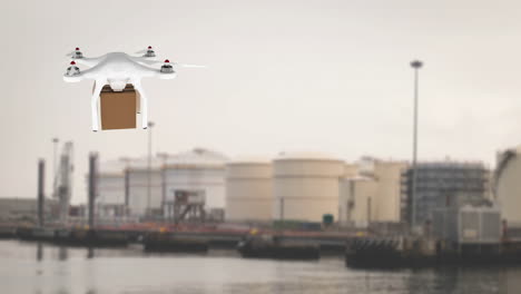 drone carrying a box in a port