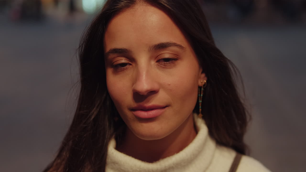 Confident Young Woman in Seville at Night