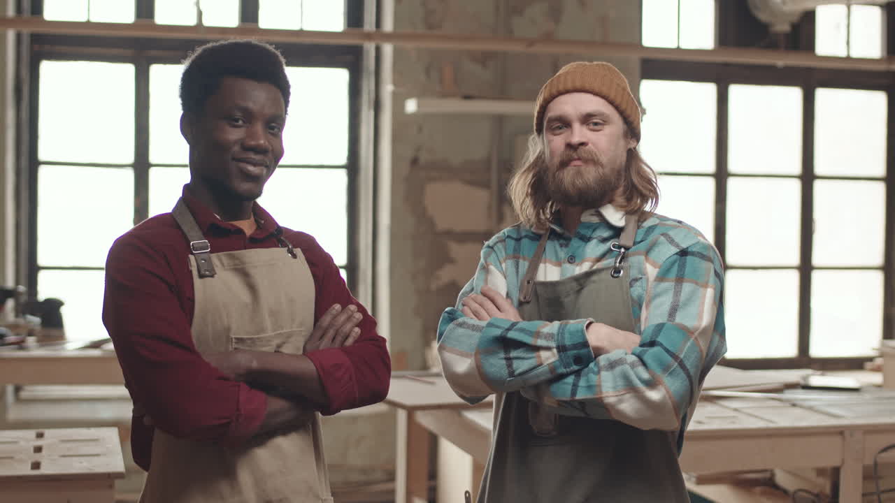 Portrait of Two Diverse Craftsmen in Workshop