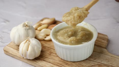 garlic paste in a small white bowl