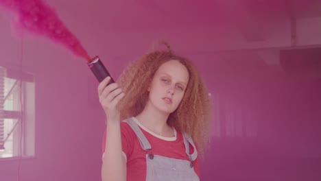 fashionable young woman in an abandoned warehouse