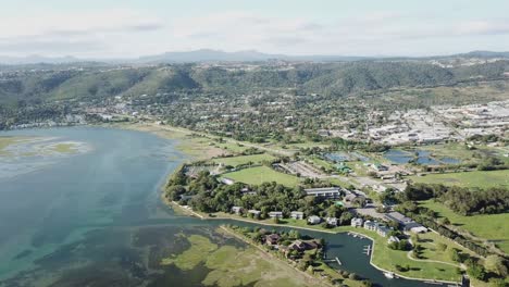 river lagoon and surrounding green hills of knysna, south africa aerial