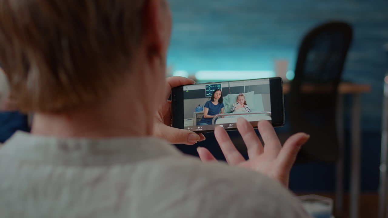 Elderly couple video calling with family