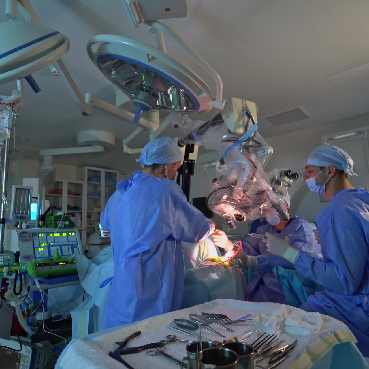 Emergency doctors in group perfoming operation. Professional neurosurgery specialists working in team