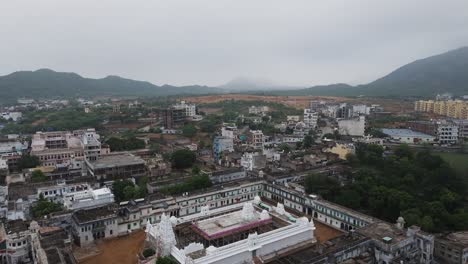ancient holy pilgrimage city pushkar temple drone fly over. india