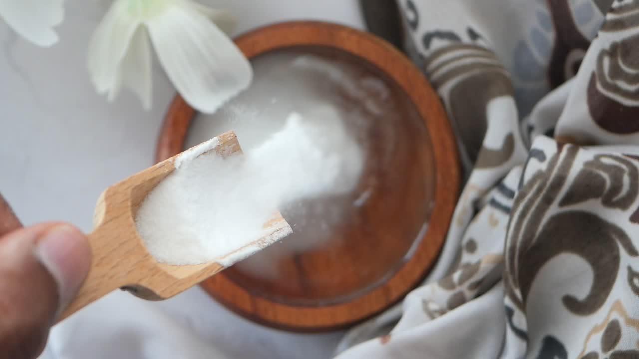 Baking Soda in a Wooden Spoon
