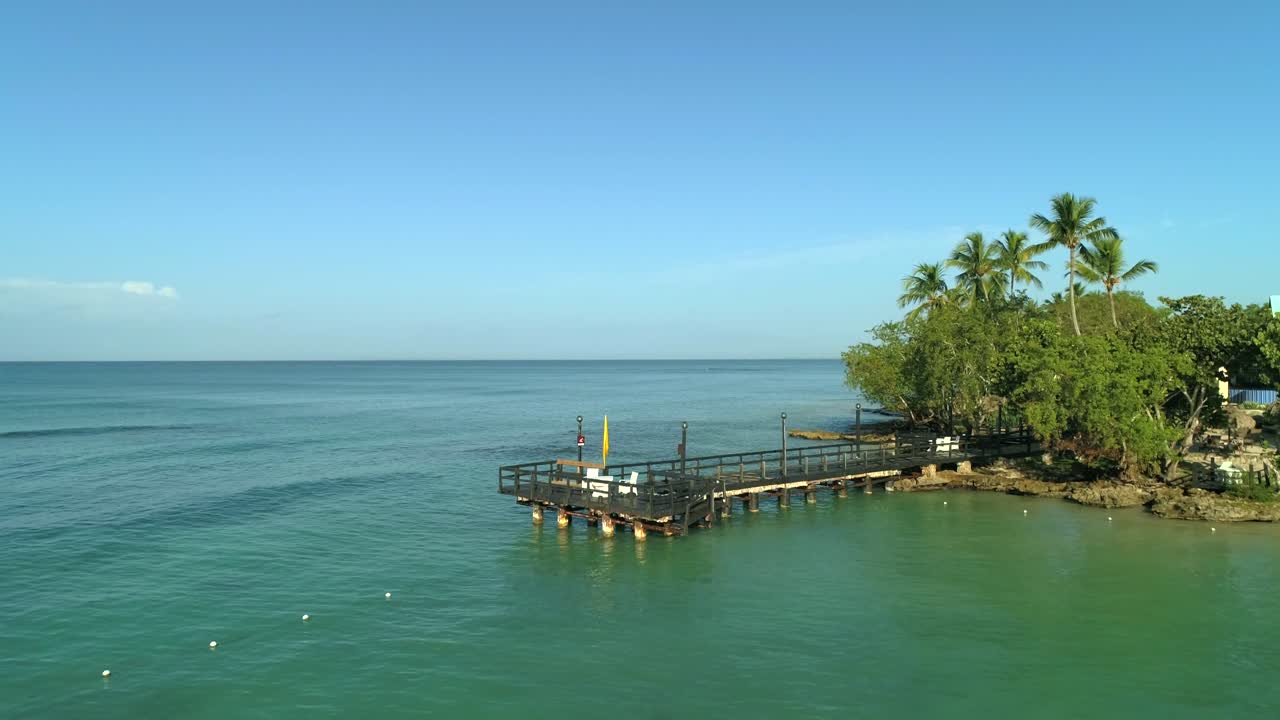 Pier of luxury resort on Bayahibe beach, Dominican Republic. Aerial approach