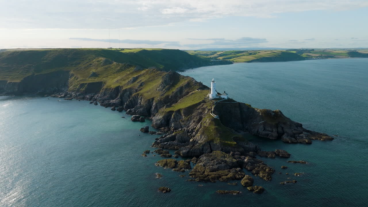 Aerial View of a Lighthouse on a Rocky Coast
