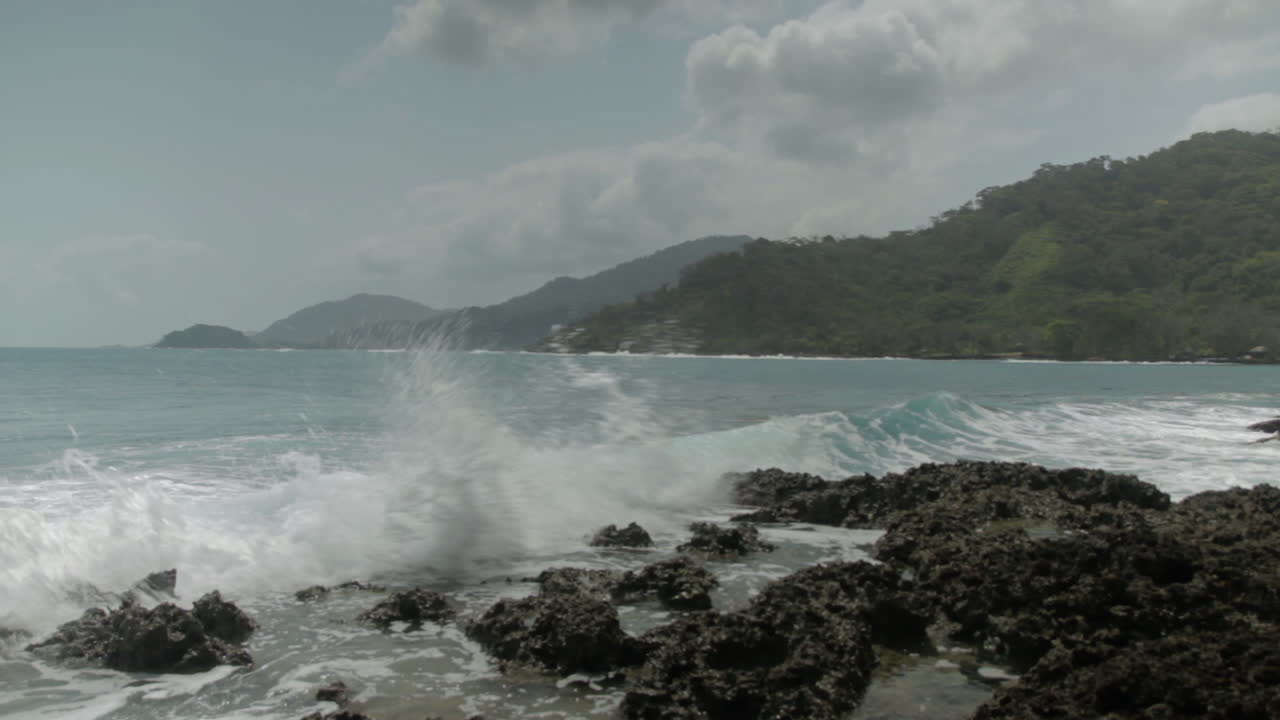 Waves crashing into rocks and nice seascape at the Darien Gap in Colombia