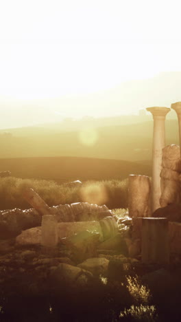 old greek temple ruins at sunset