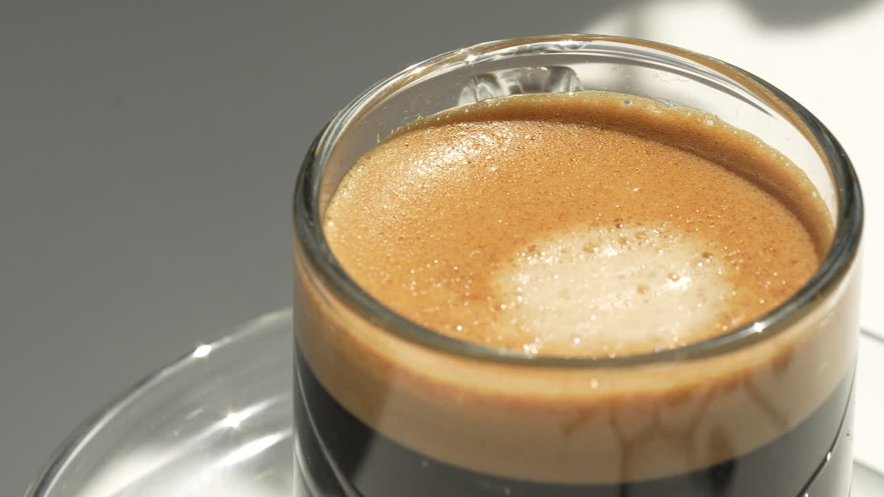 &amp;quot;An elegant glass transparent cup with freshly brewed espresso