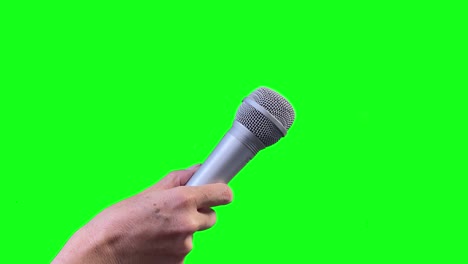 micrófono aislado en pantalla verde, micrófono cortado en fondo de croma verde.