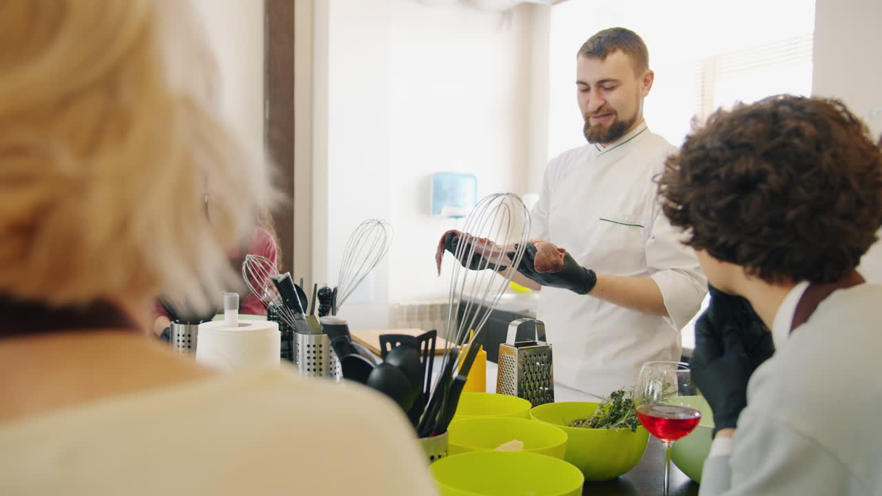 Cooking Class - Chef Demonstrating Meat Preparation