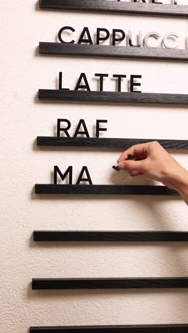 coffee shop menu board with black letters