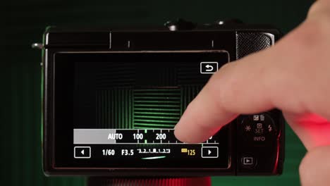 Adjustment of ISO done in mirrorless camera, close up view