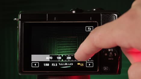 adjustment of iso done in mirrorless camera, close up view