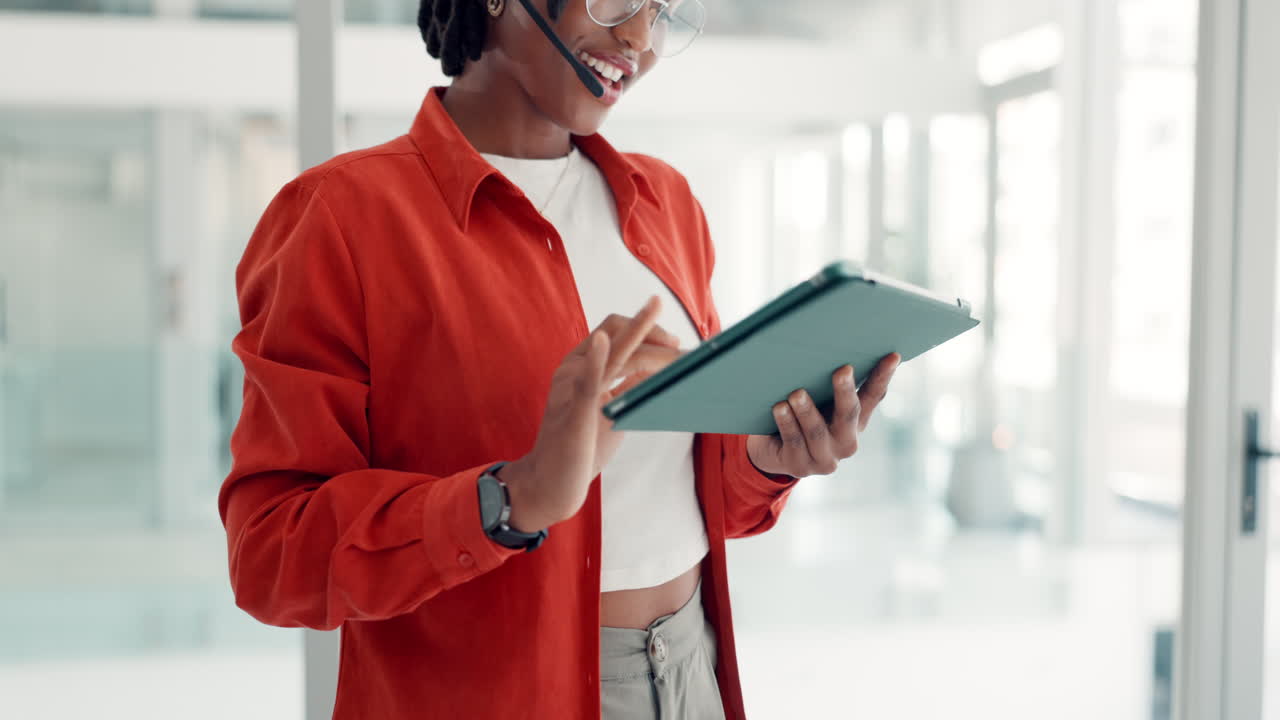 Businesswoman using tablet in office