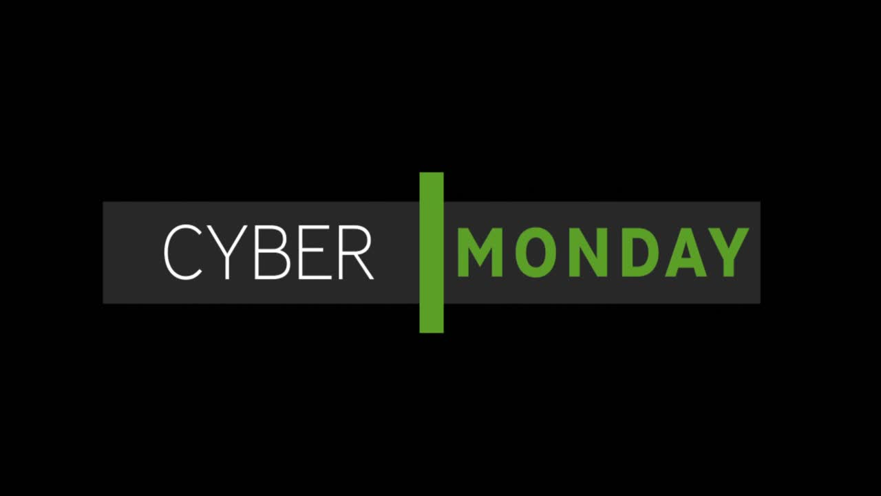 texto blanco y verde de cyber monday que aparece contra una pantalla negra