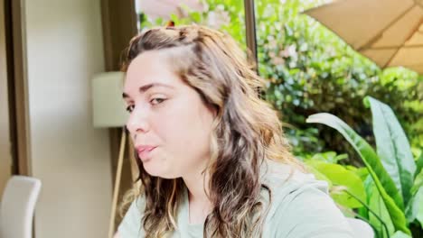 relaxed lifestyle moment in a lush green cafe