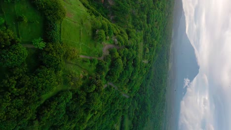 vulcano-mountain-Agung,-vertical-drone-zoom-out-shot-of-Bukit-Asah-Desa,-bugbug