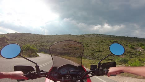 Riding-a-motorcycle-on-Penteli-mountain-in-Greece