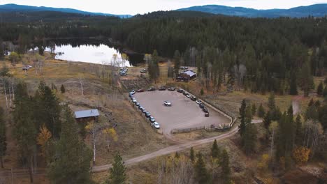 aerial footage of land rover suvs parked in a circle