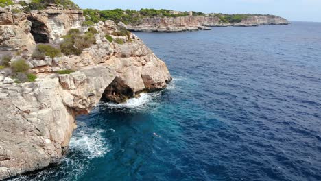 aerial view of spectacular spanish shoreline, featuring rocky caves, stacks and arches