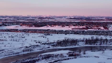 drone footage of calgary's golden hour during a beautiful winter sunrise