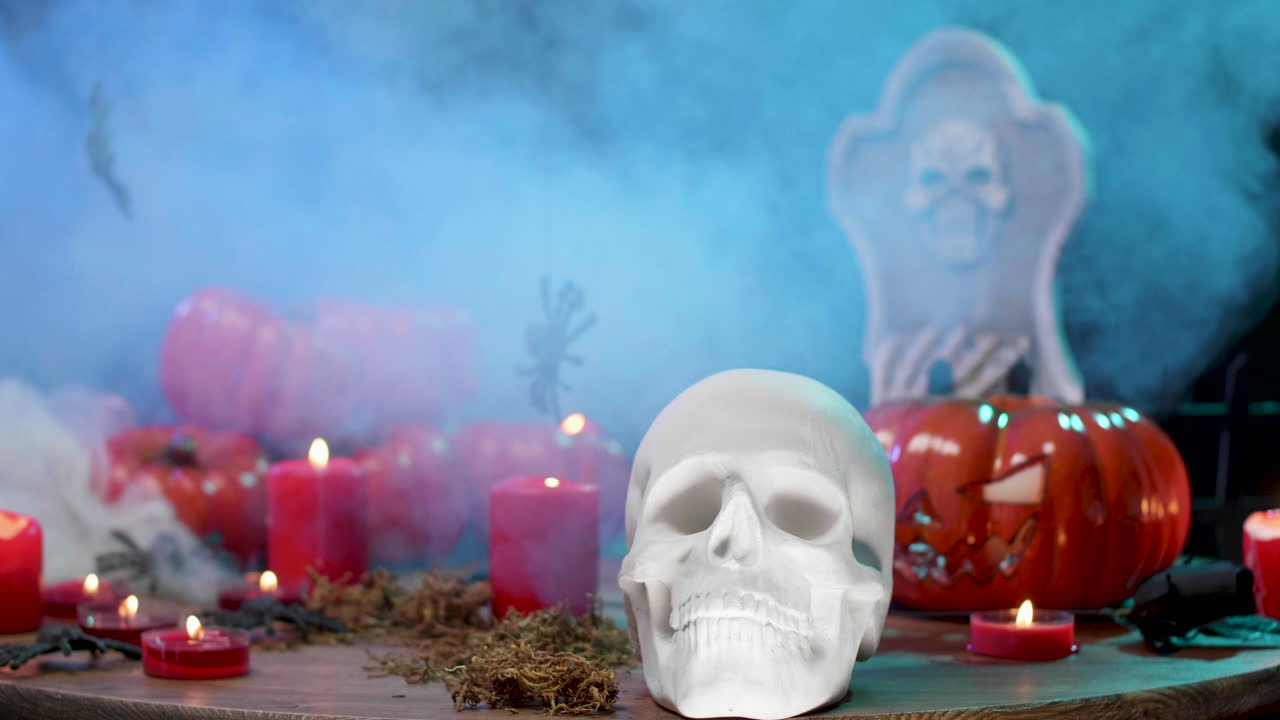 Halloween Scene with Skull, Pumpkins, and Candles