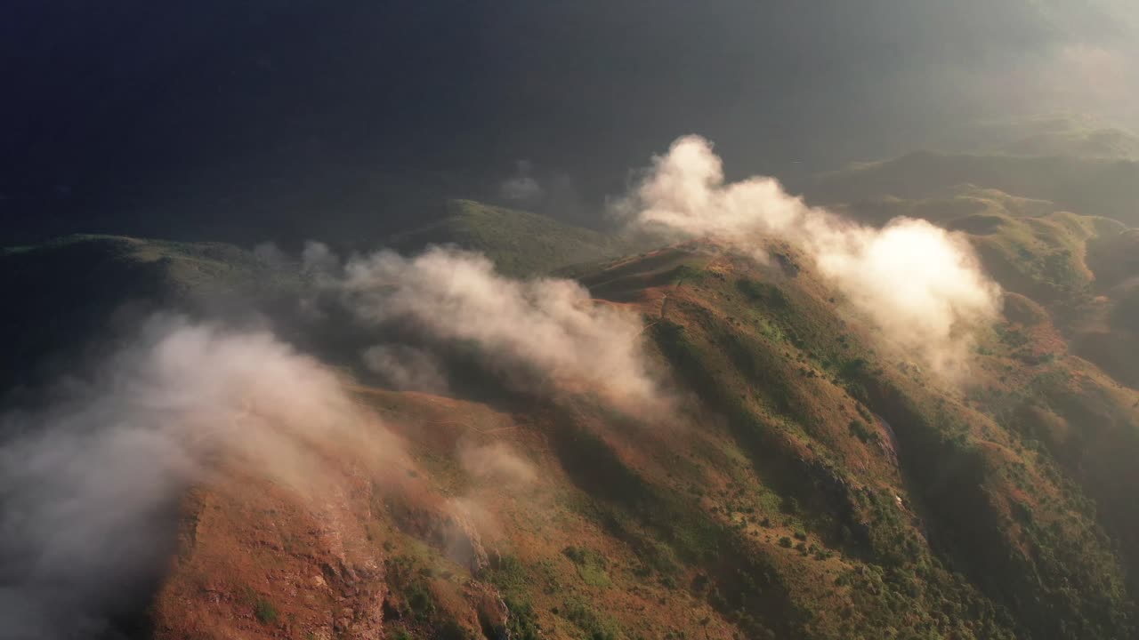 Moody landscape on Lantau island in Hong Kong 4k sunrise. Landscape of Lantau Island, Hong Kong, China.The ridge of the Lantau peak (960m) in Lantau island, the largest island in Hong Kong