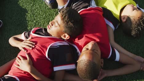 soccer kids resting in a sunny day