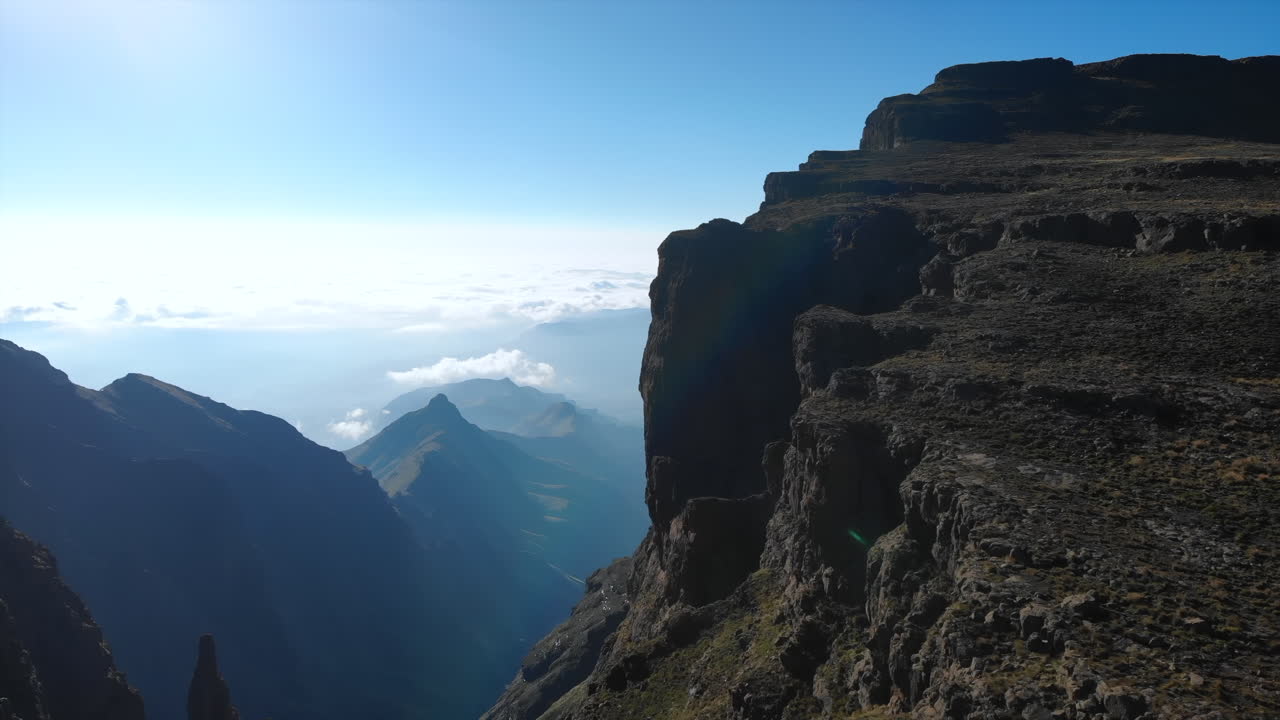 Mountain Vista with Cliffs and Clouds
