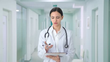 Indian-female-doctor-talking-to-patient