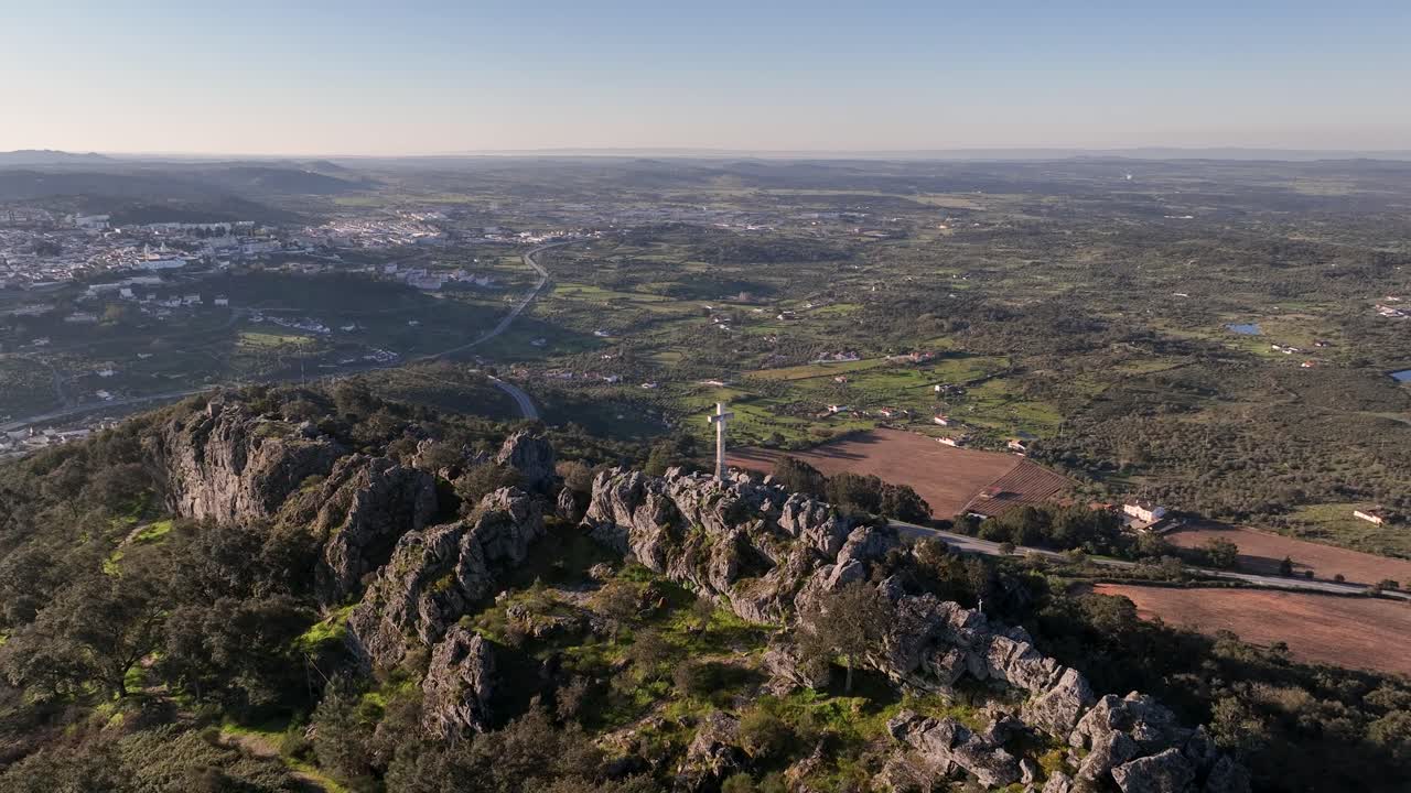 Aerial view above Monte São Tomé or Serra da Penha, with its rugged cliffs, lush valleys, and ancient hermitage, offering stunning views and a glimpse into Alentejo’s natural and spiritual heritage.