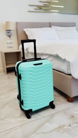 luxury hotel room with luggage