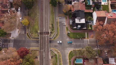 Slow-motion-view-of-cars-passing-under-the-railway-bridge