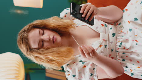 young woman using credit bank card and smartphone transferring money purchases online shopping