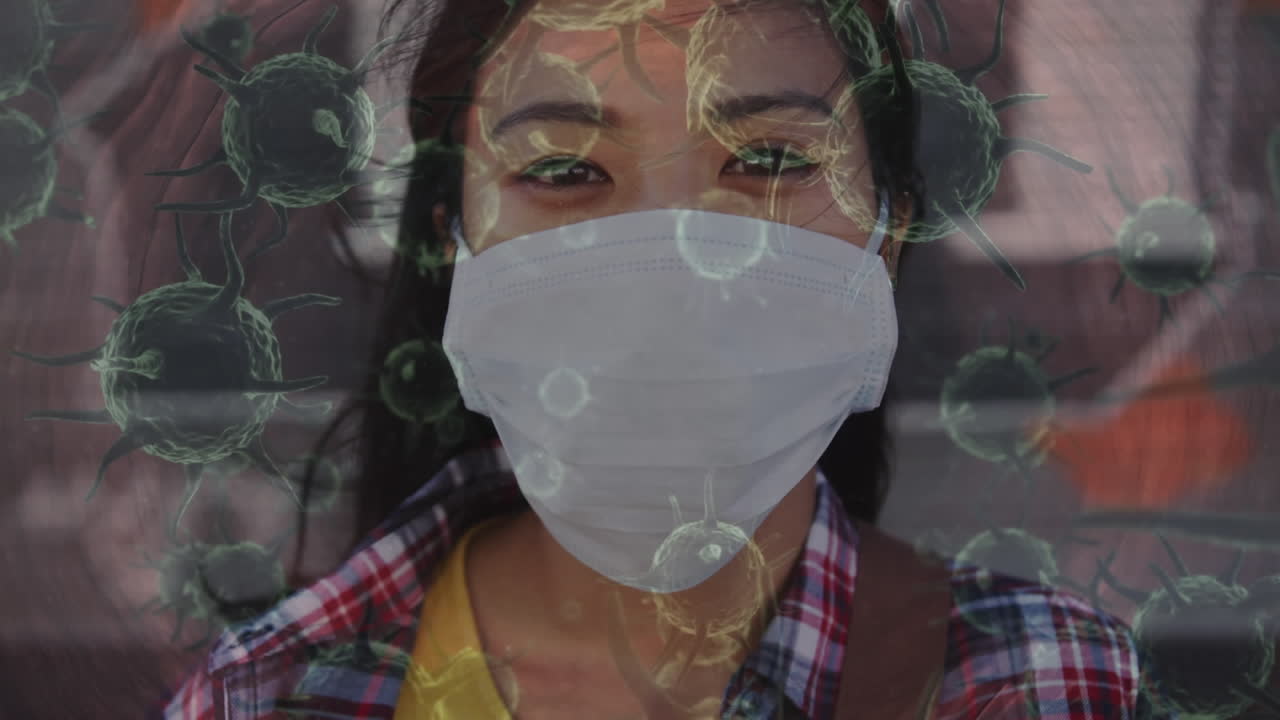 Animation of covid 19 cells moving over woman in face mask