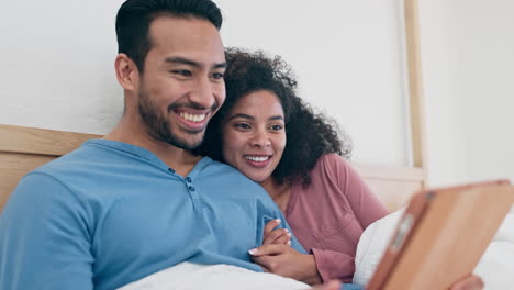 Tablet,-happy-and-couple-in-bed-networking