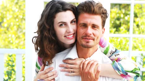 portrait of romantic couple embracing each other
