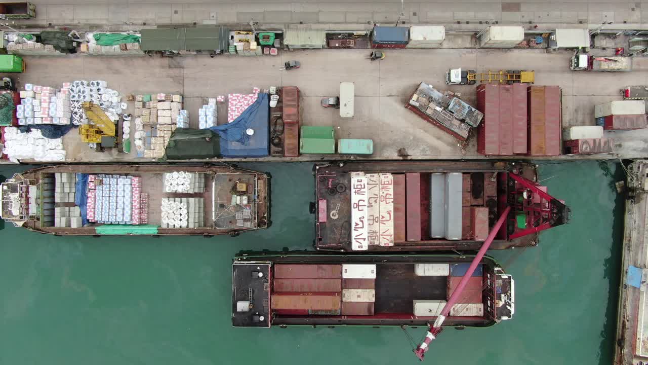 Small feeder type Container barges operating in Hong Kong pillar point dock