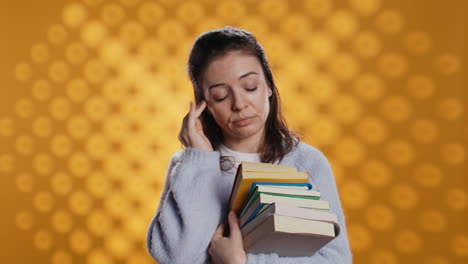 woman feeling migraine pain from textbooks needed for homework