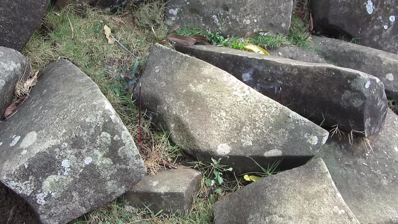 Incense burning as a traditional ritual at the Gunung Padang Megalithic Site in Cianjur, West Java, Indonesia
