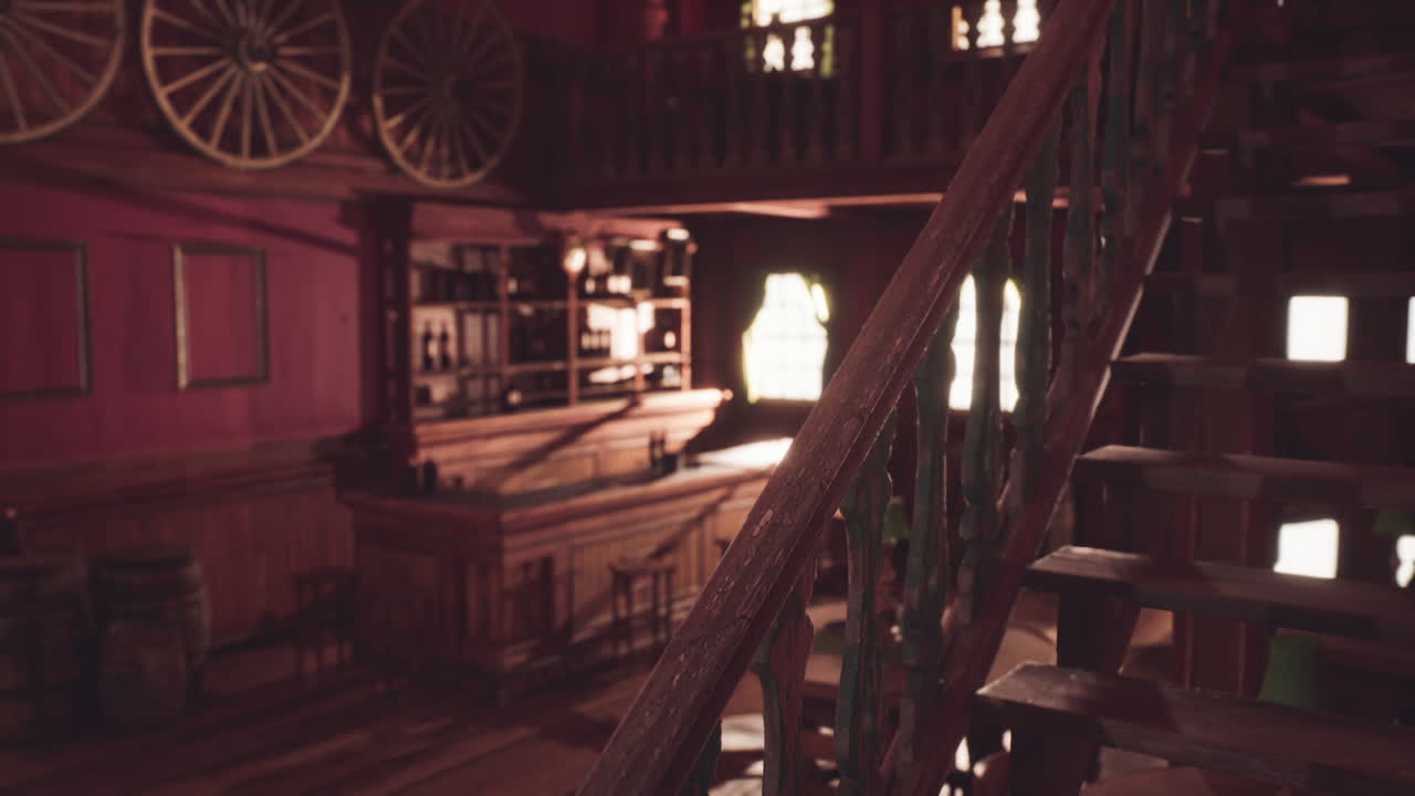 Inside a historic saloon with wooden decor and a staircase during golden hour