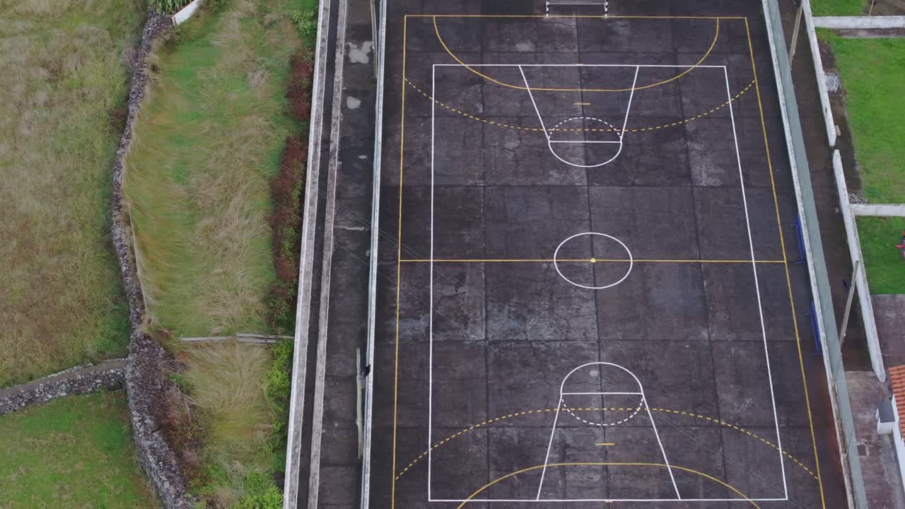 Drone view of soccer court at Faj&atilde; Grande village in Azores, Portugal