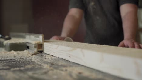 cutting boards on a circular saw in a joinery