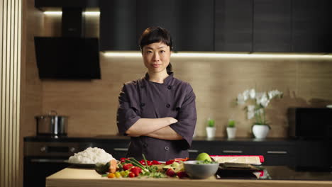 asian chef preparing sushi ingredients in modern kitchen