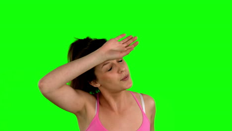 fit woman jogging on green screen