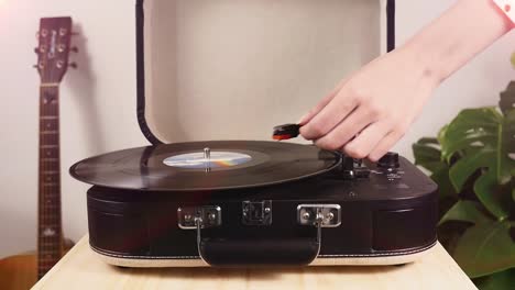 Girl-playing-songs-on-a-record-player