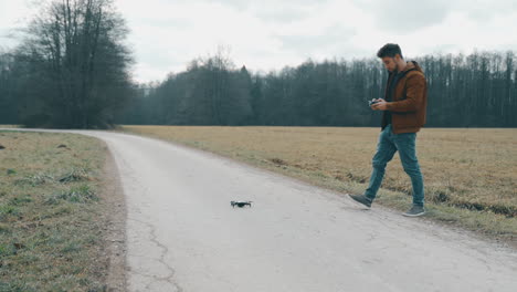 Young-man-flying-a-drone-outside-1